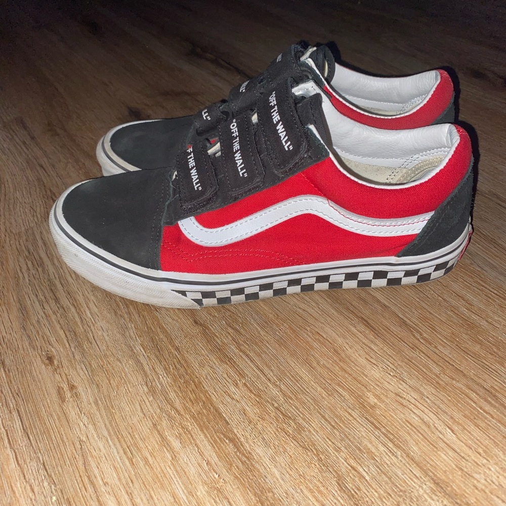 Custom red and black Velcro vans with checkered board